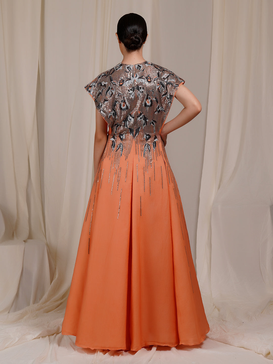 A Peach organza Silk Jacket Gown With Sturdy And Extended Shoulders