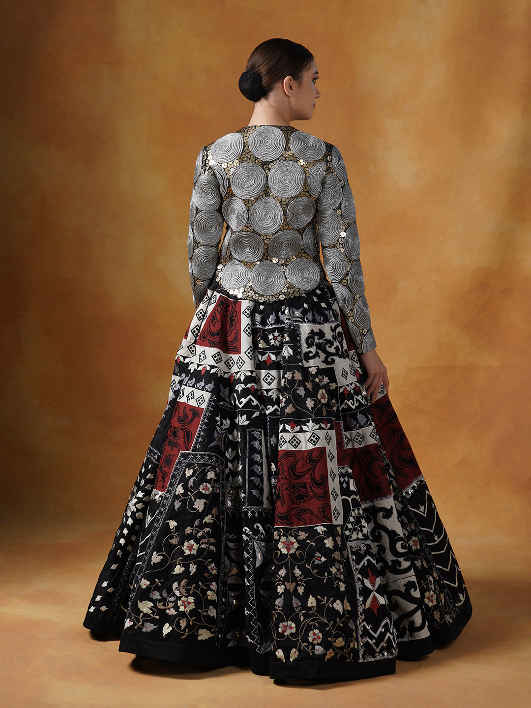 Lehenga set with in cotton silk adorned in dori, sequence and silk yarns embroideries.