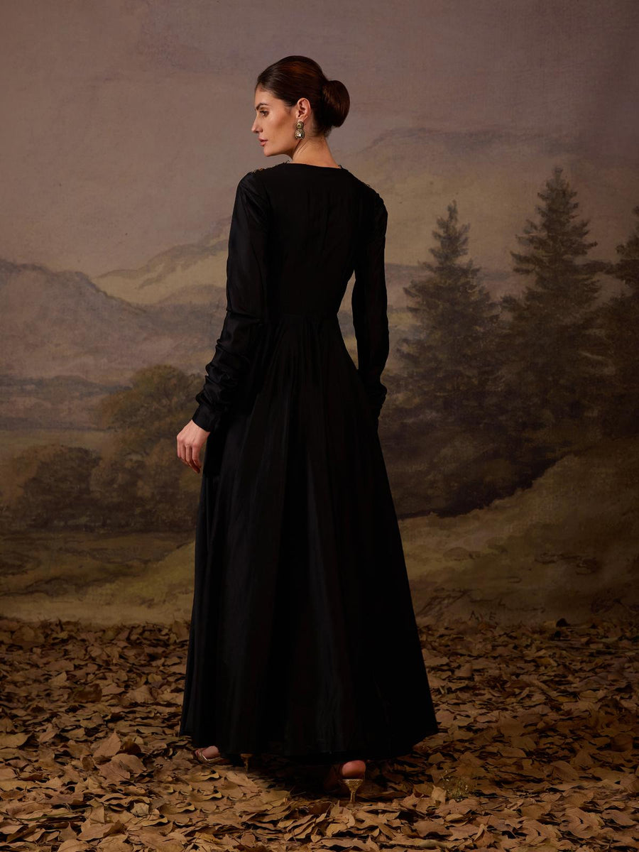 A beautiful black dress featuring bold floral embroidery – Samant Chauhan
