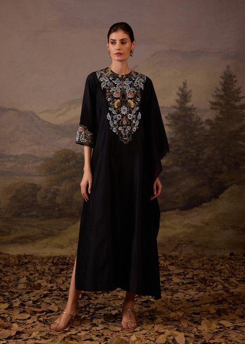 A comfortable yet elegant black caftan-style dress.
