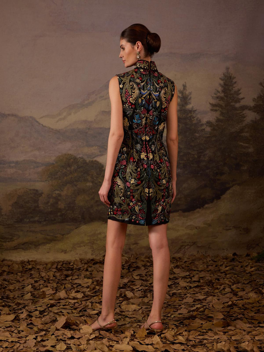 A elegant high-neck multicolored floral mini dress.