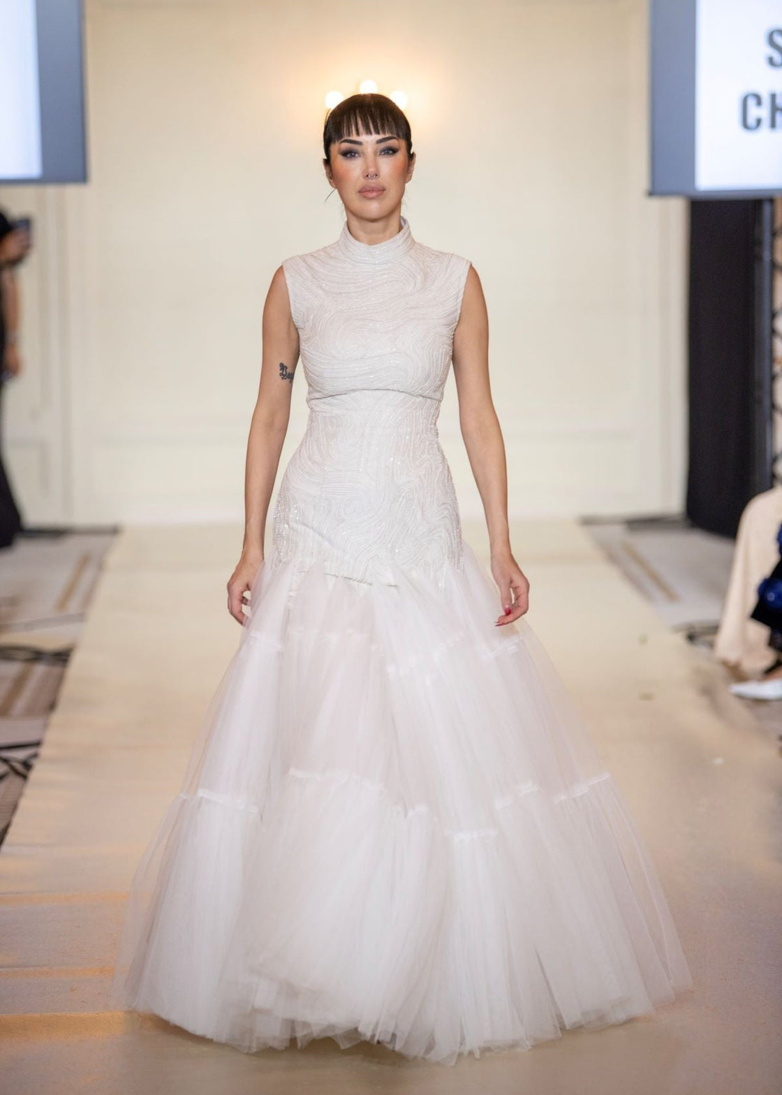 A elegant sleeveless gown features a high neckline and a fitted - samantchauhan Apparel & Accessories