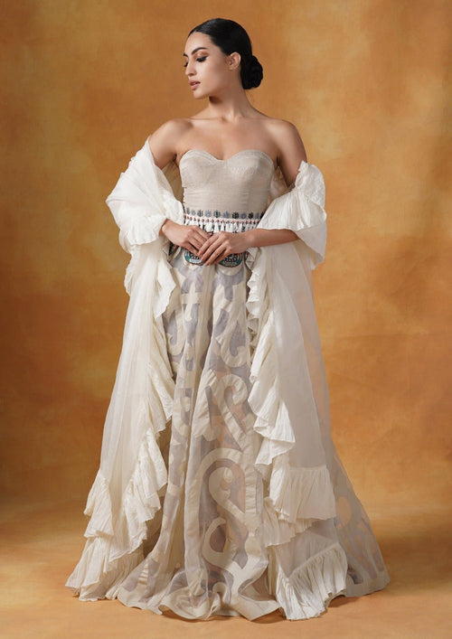 A tube corset in cotton paired with an Ivory appliqué work skirt and organza Dupatta with cotton frill. - samantchauhan Apparel & Accessories