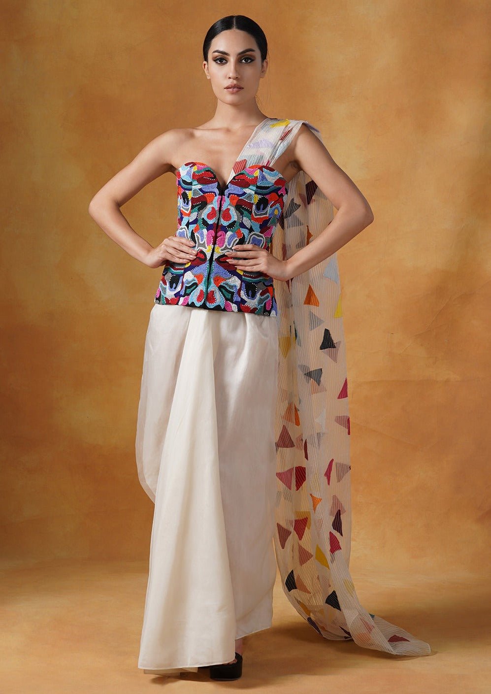 Corset that is intricately embroidered in colorful beads, decorated with a printed pallu and is paired with a plain white cotton silk drape skirt. - samantchauhan Apparel & Accessories