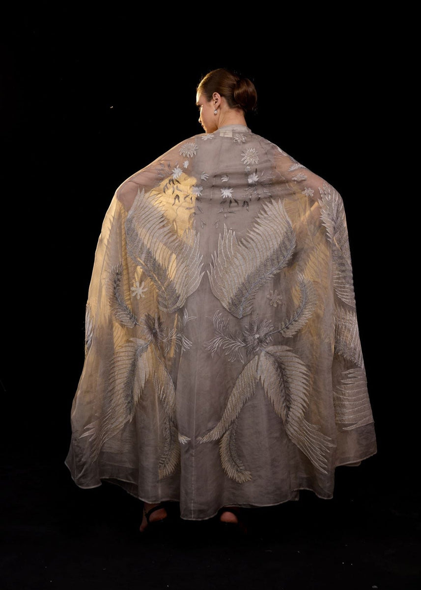 ethereal embroidered gown, featuring a flowing silhouette and a