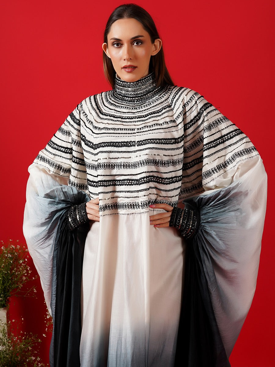 Cotton silk kaftan in Ombre of white and black with a high neckline.