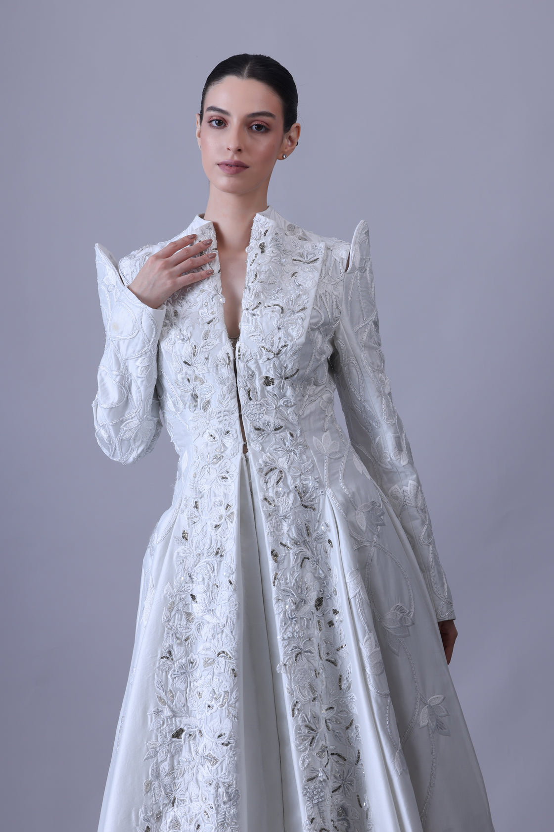 Make a bold statement in this regal full-sleeve gown