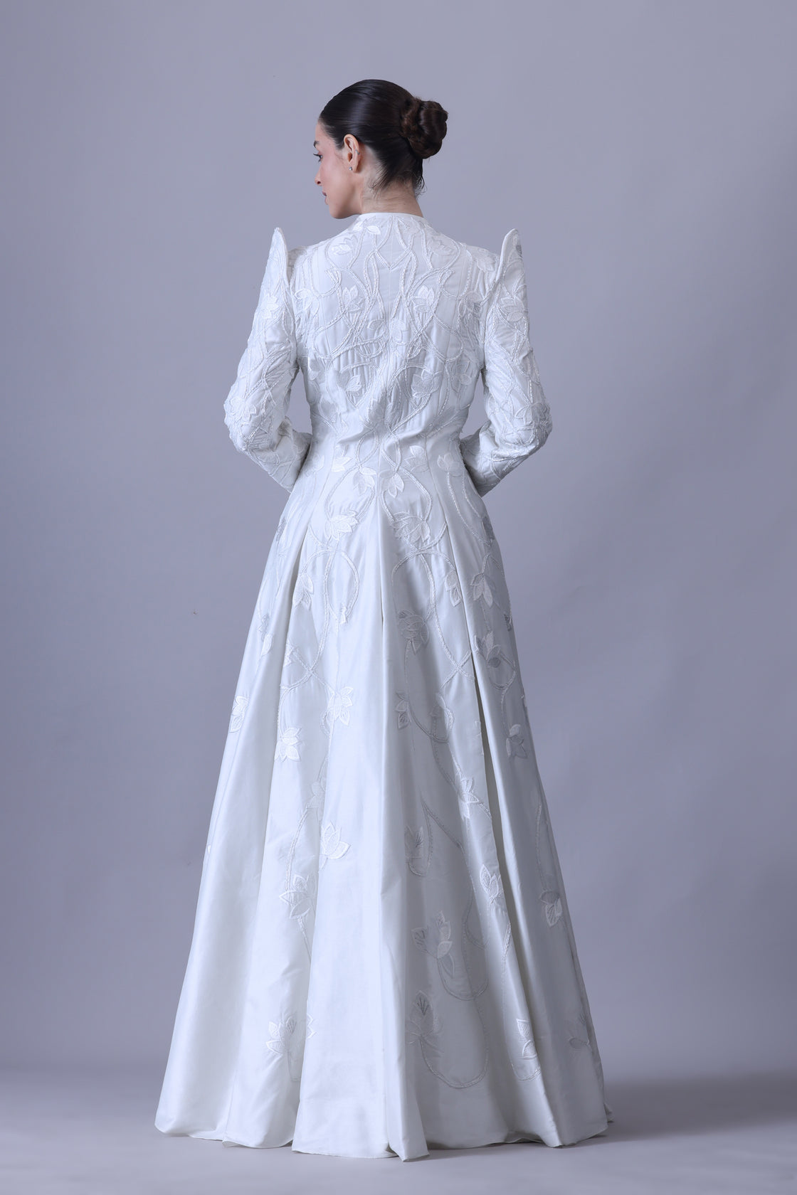 Make a bold statement in this regal full-sleeve gown