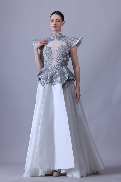 A striking evening gown featuring a sculptural
