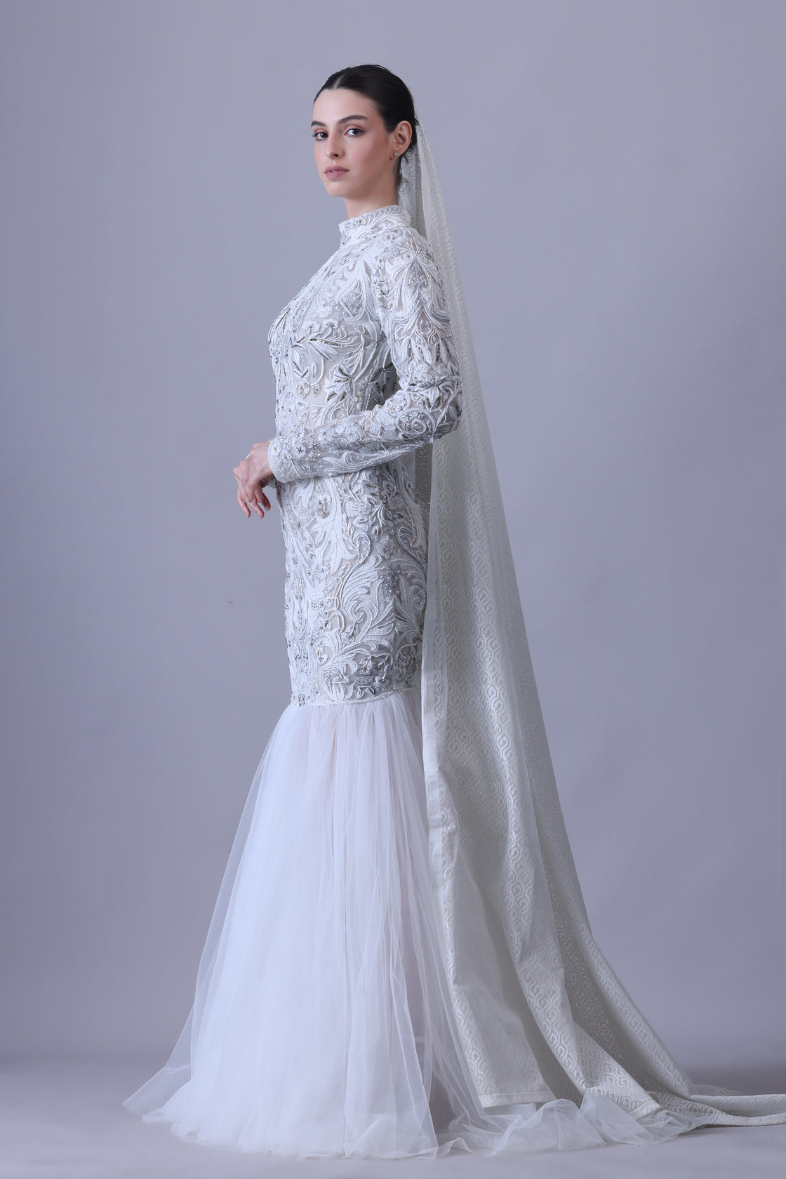 Exude timeless elegance in this high-neck gown