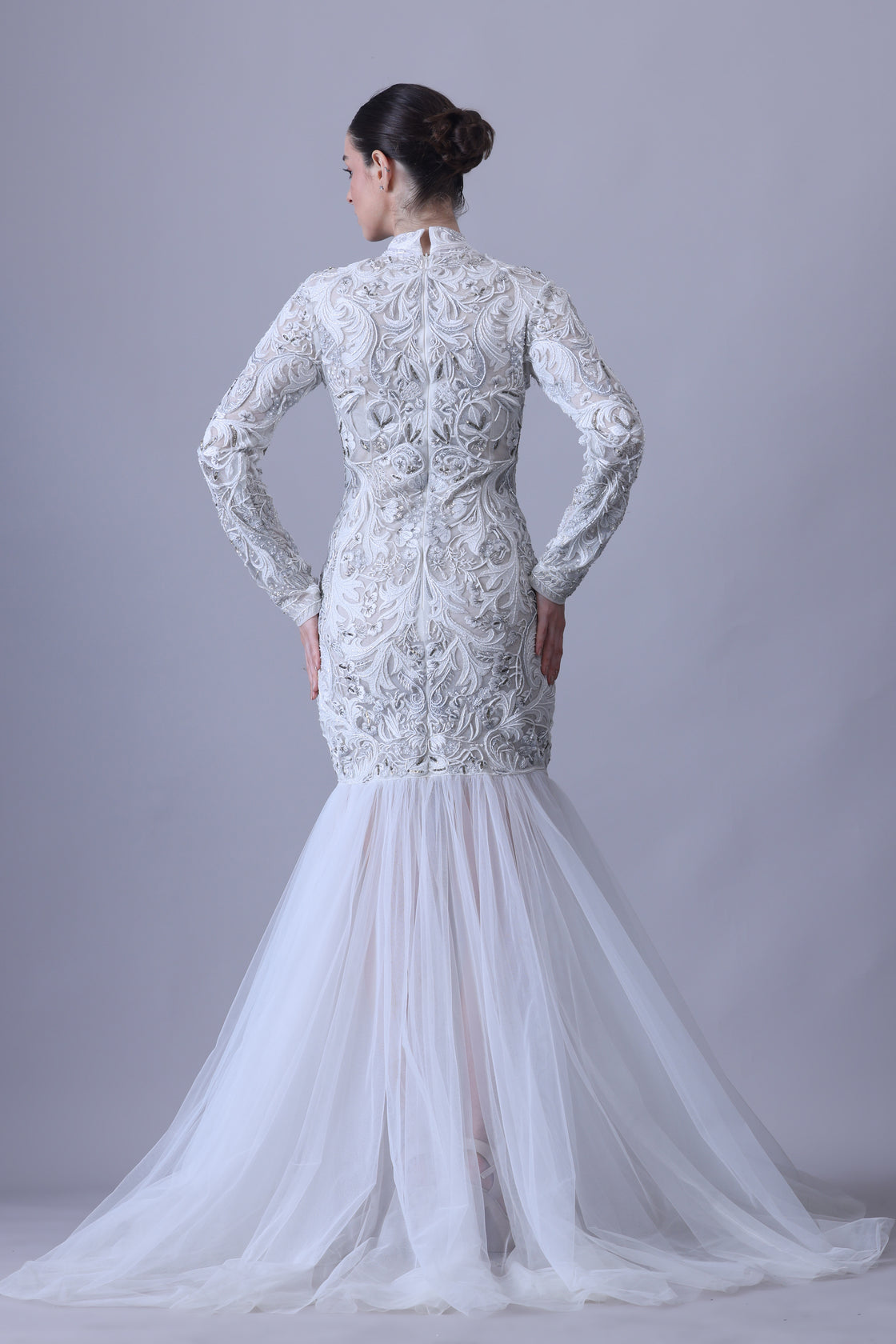 Exude timeless elegance in this high-neck gown