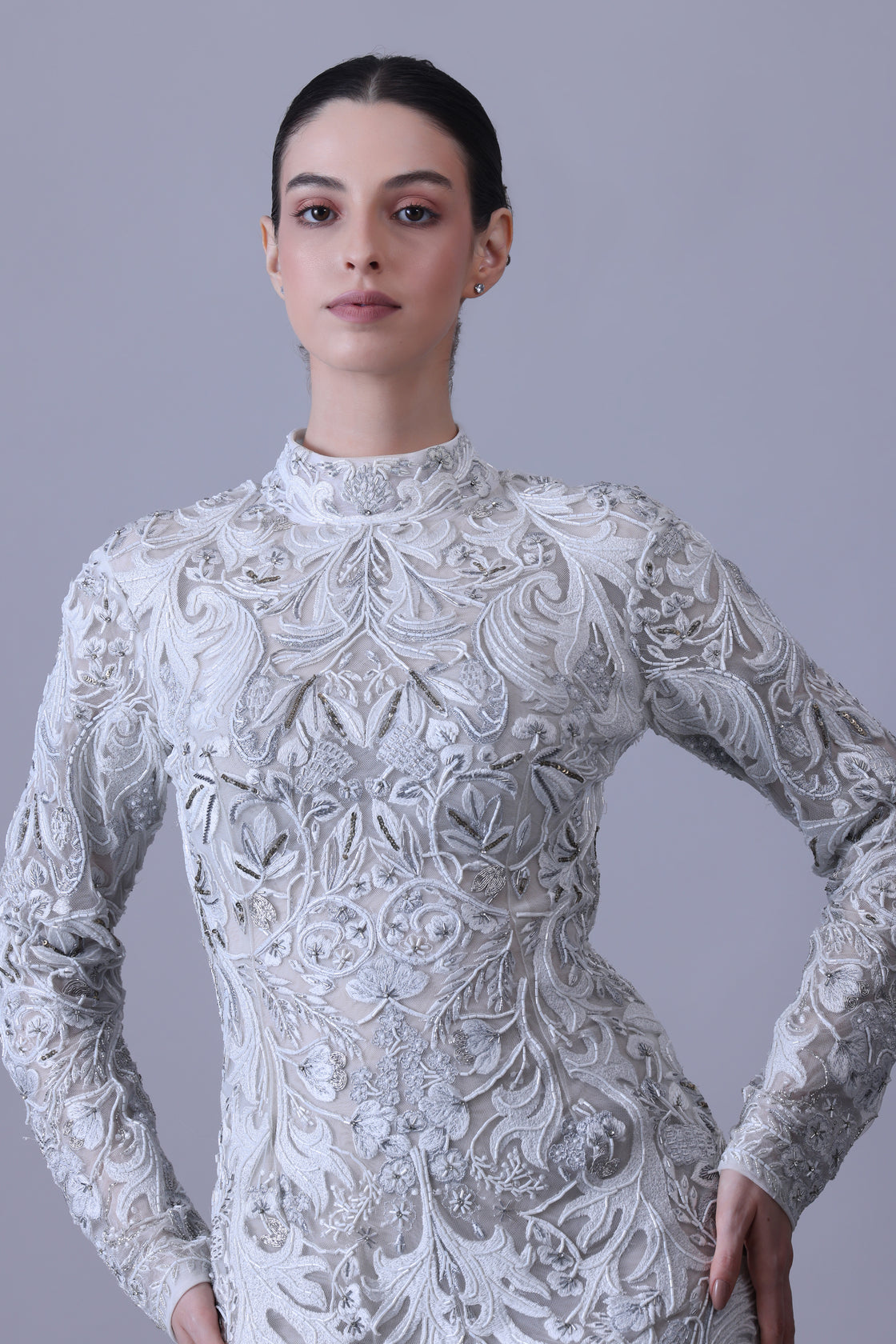 Exude timeless elegance in this high-neck gown