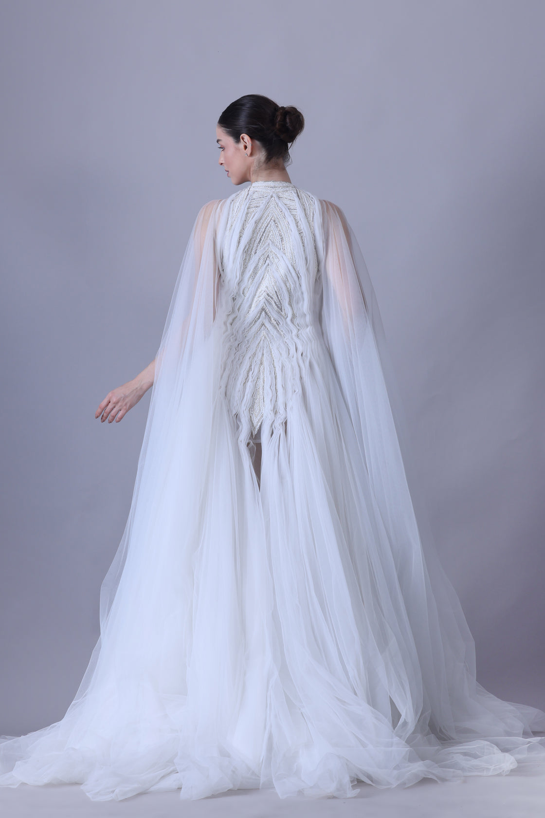 Radiate elegance in this ethereal white gown