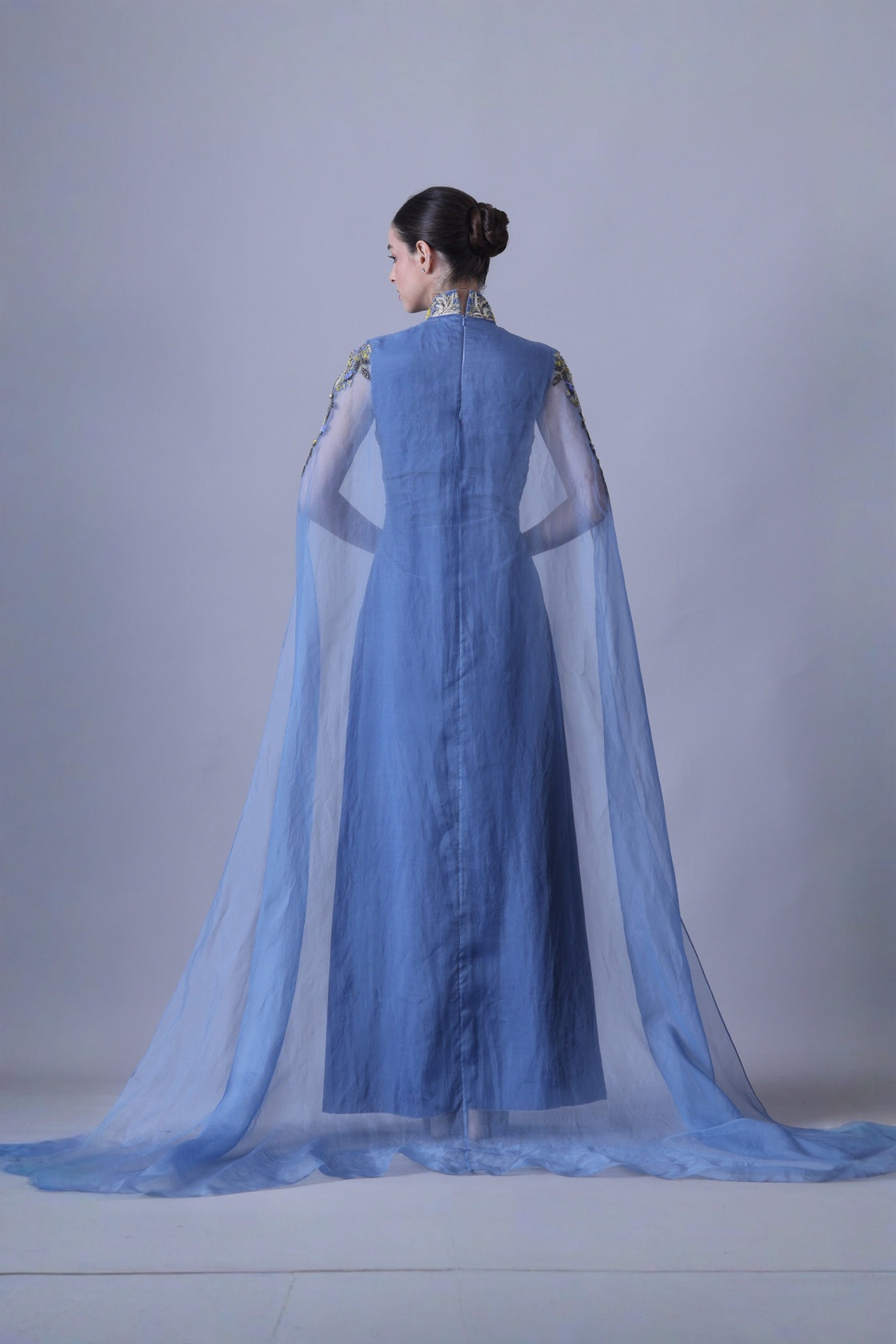 Blue Gown With Artisanal Embroidery And Ethereal Cape Sleeves