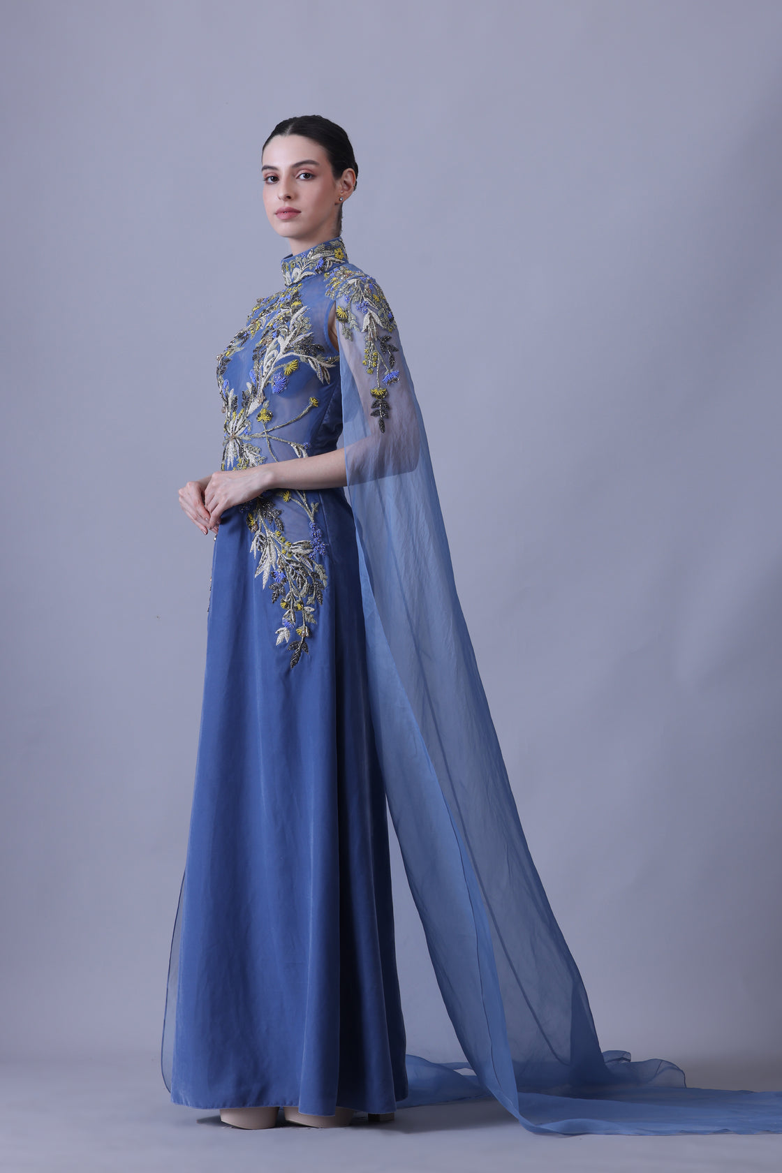 Blue Gown with Artisanal Embroidery and Ethereal Cape Sleeves