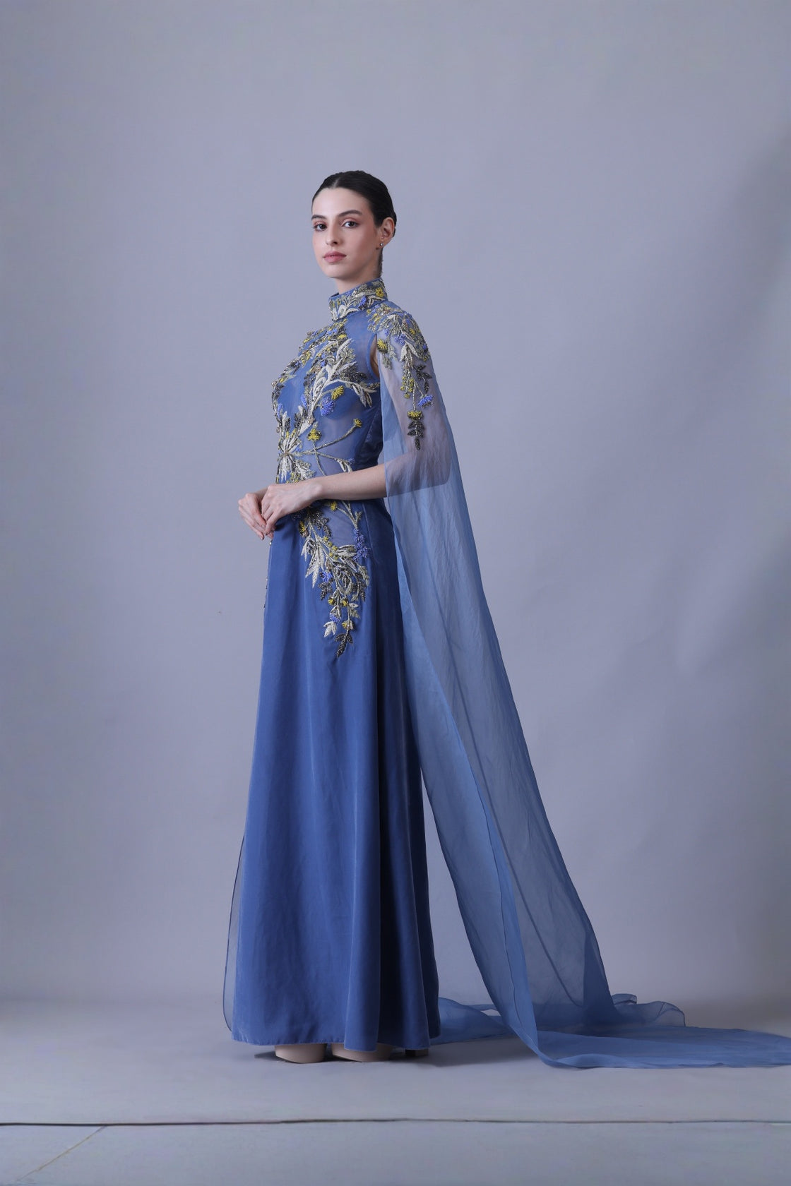 Blue Gown With Artisanal Embroidery And Ethereal Cape Sleeves