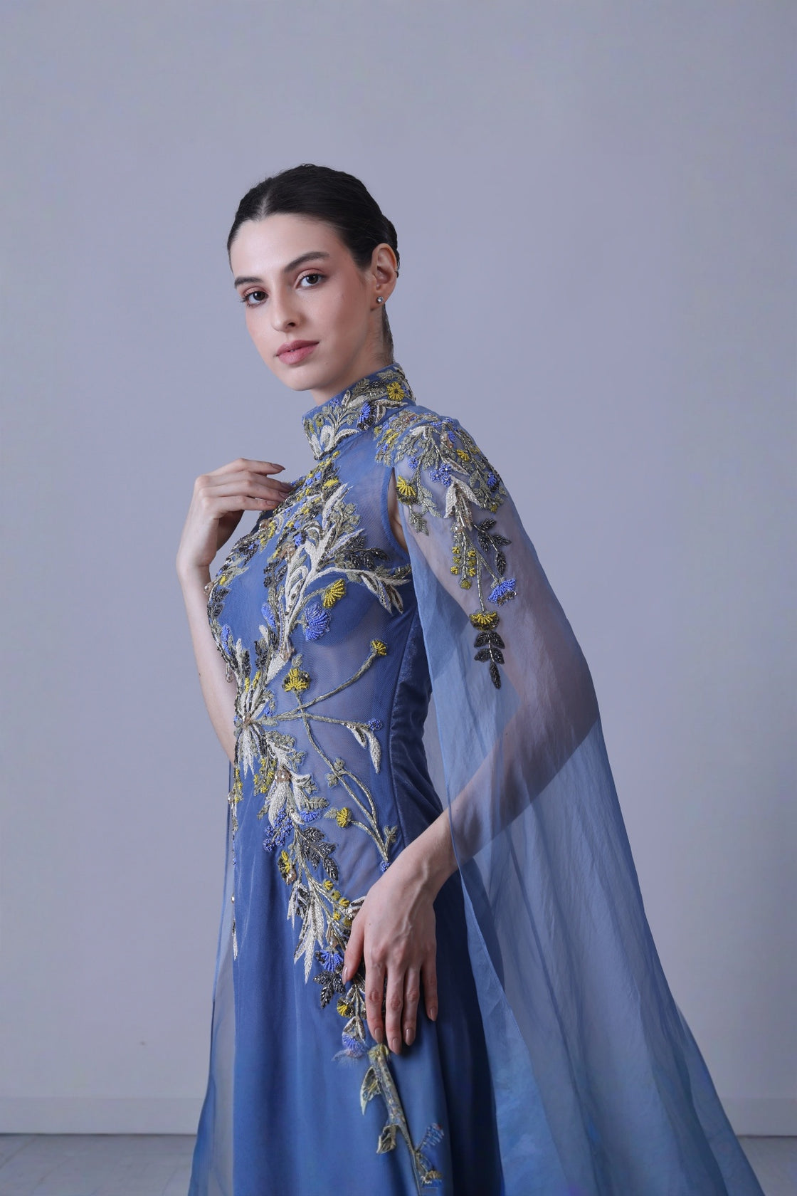 Blue Gown With Artisanal Embroidery And Ethereal Cape Sleeves