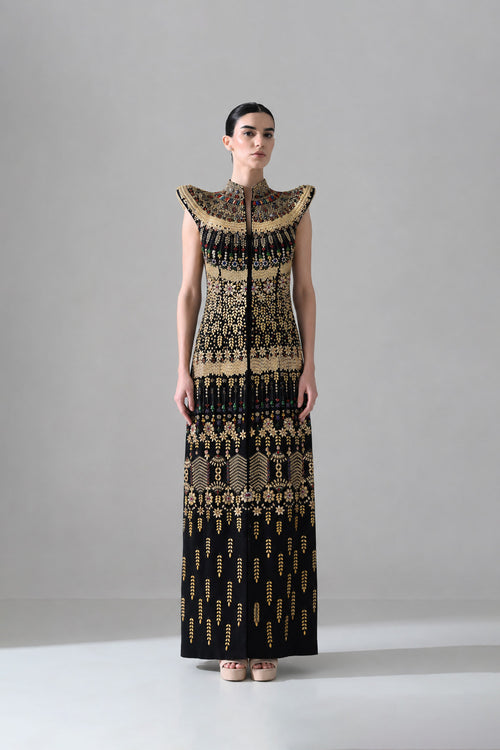 Black Silhouette With Structured Shoulders And Ornate Gold Embroidery