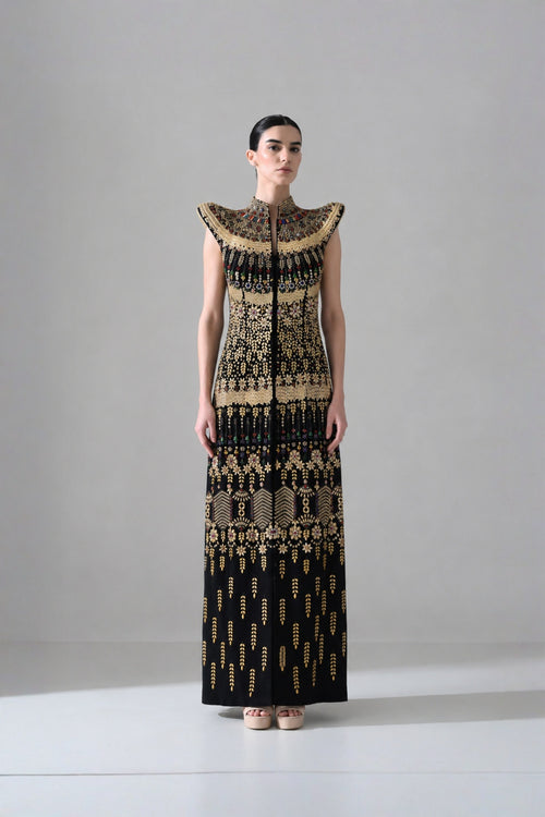 Black Silhouette With Structured Shoulders And Ornate Gold Embroidery