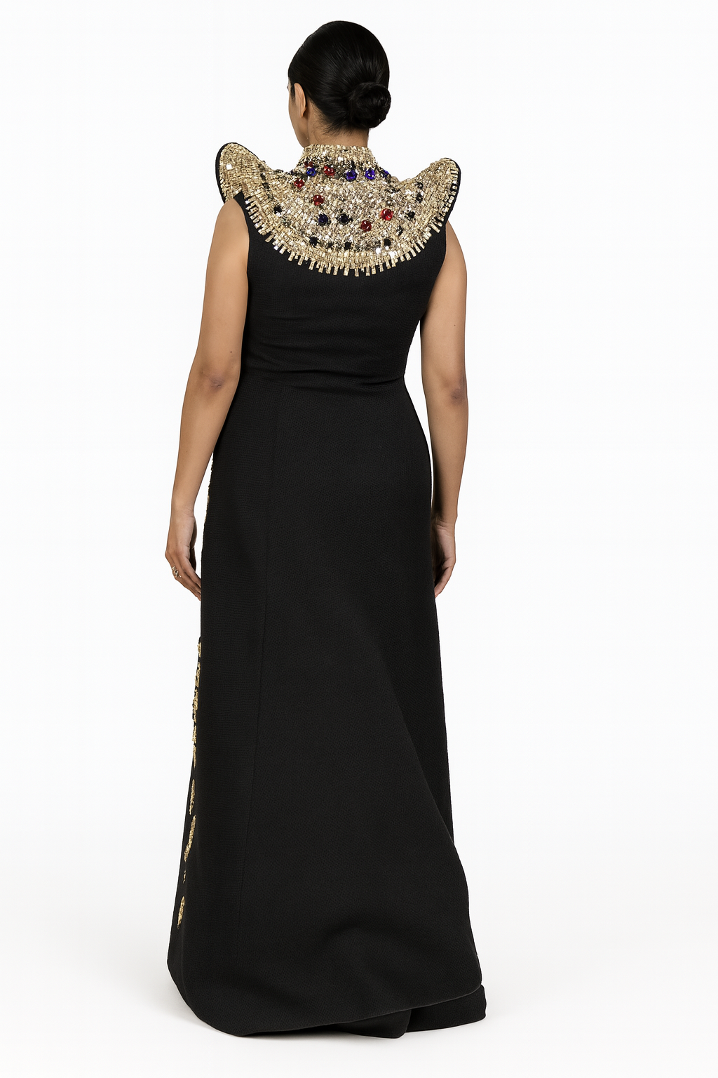 Black Silhouette with Structured Shoulders and Ornate Gold Embroidery