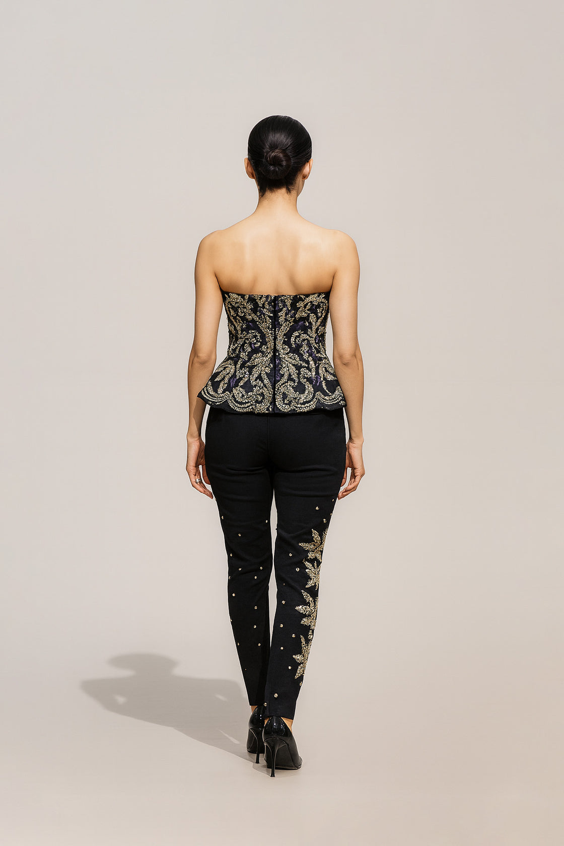 Elegant Black Co-Ord Set With An Embroidered Strapless Top And Embellished Trousers