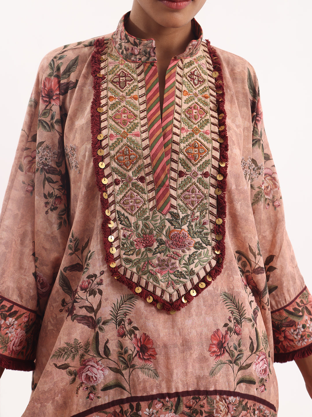 Printed kaftan paired with a draped dhoti.