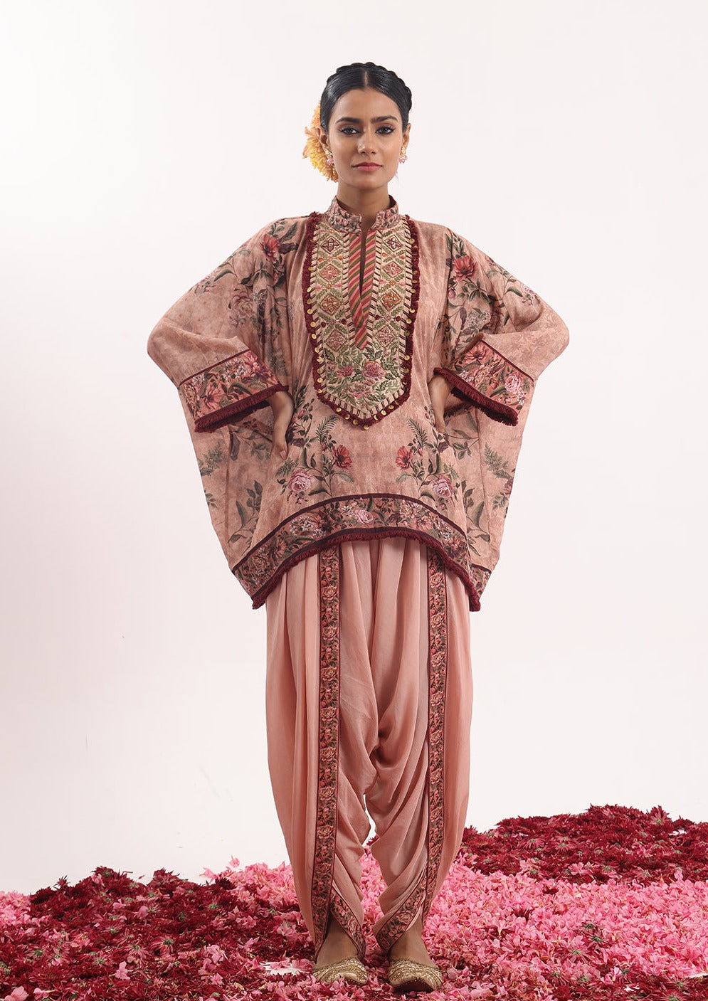 Printed kaftan paired with a draped dhoti.