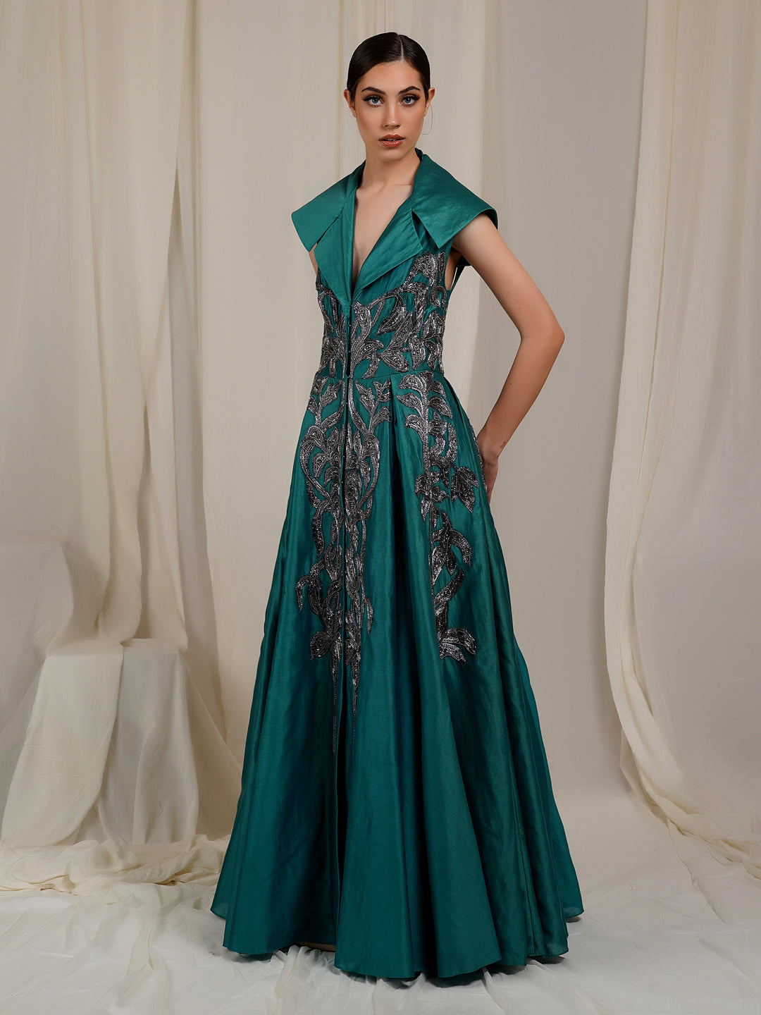 A Green Cotton silk Floor-Length Dress That Has A Plunging V-Neck
