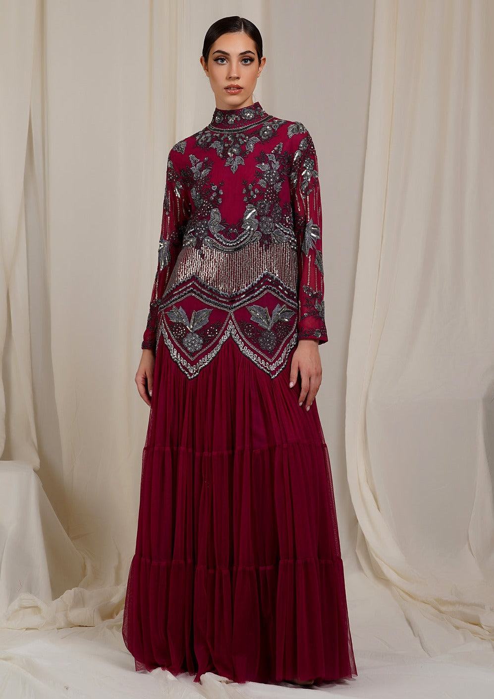 A-Line, High Neck Gown In net At The Top That Is Adorned With Unique Patterns