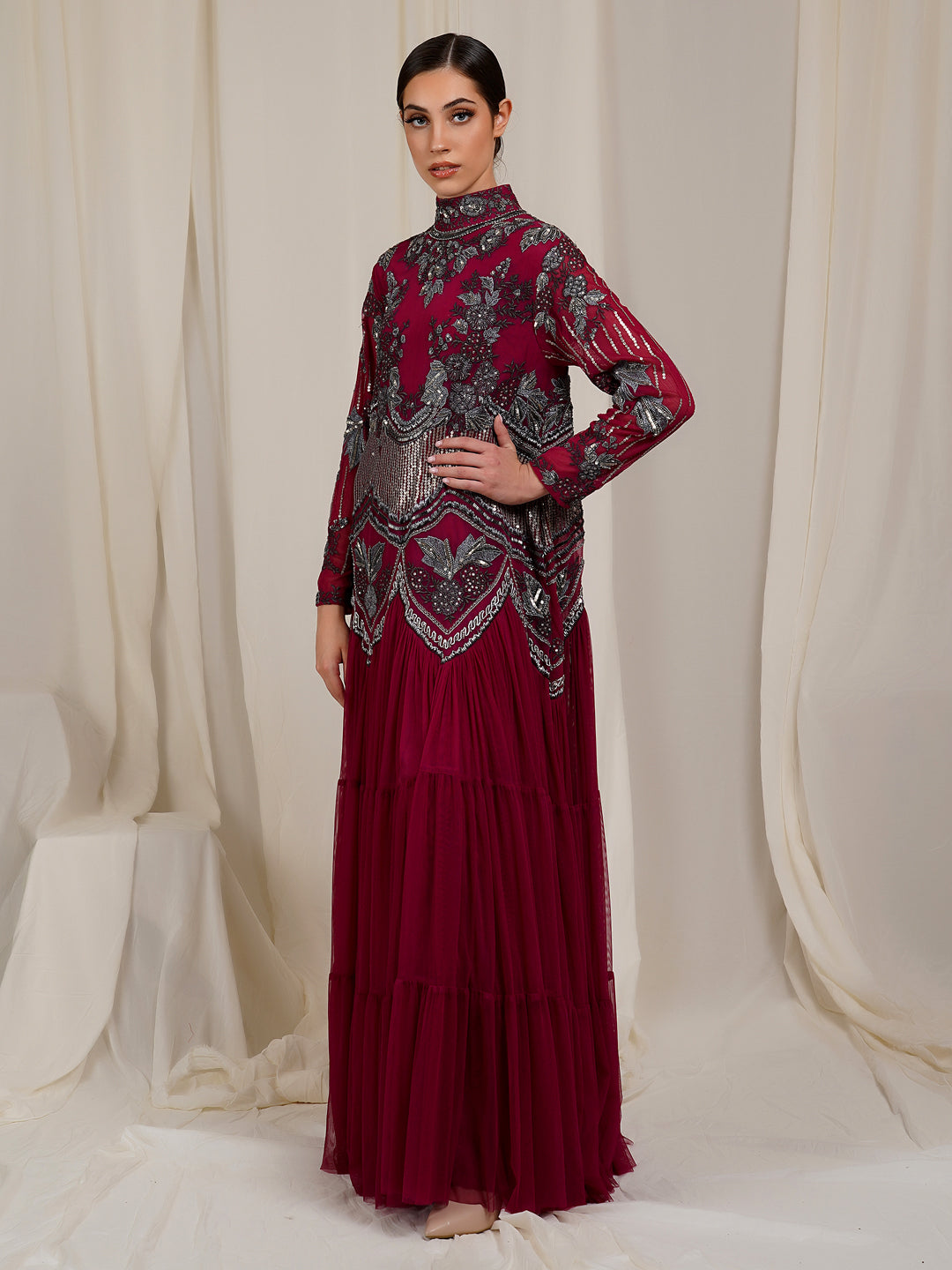 A-Line, High Neck Gown In net At The Top That Is Adorned With Unique Patterns