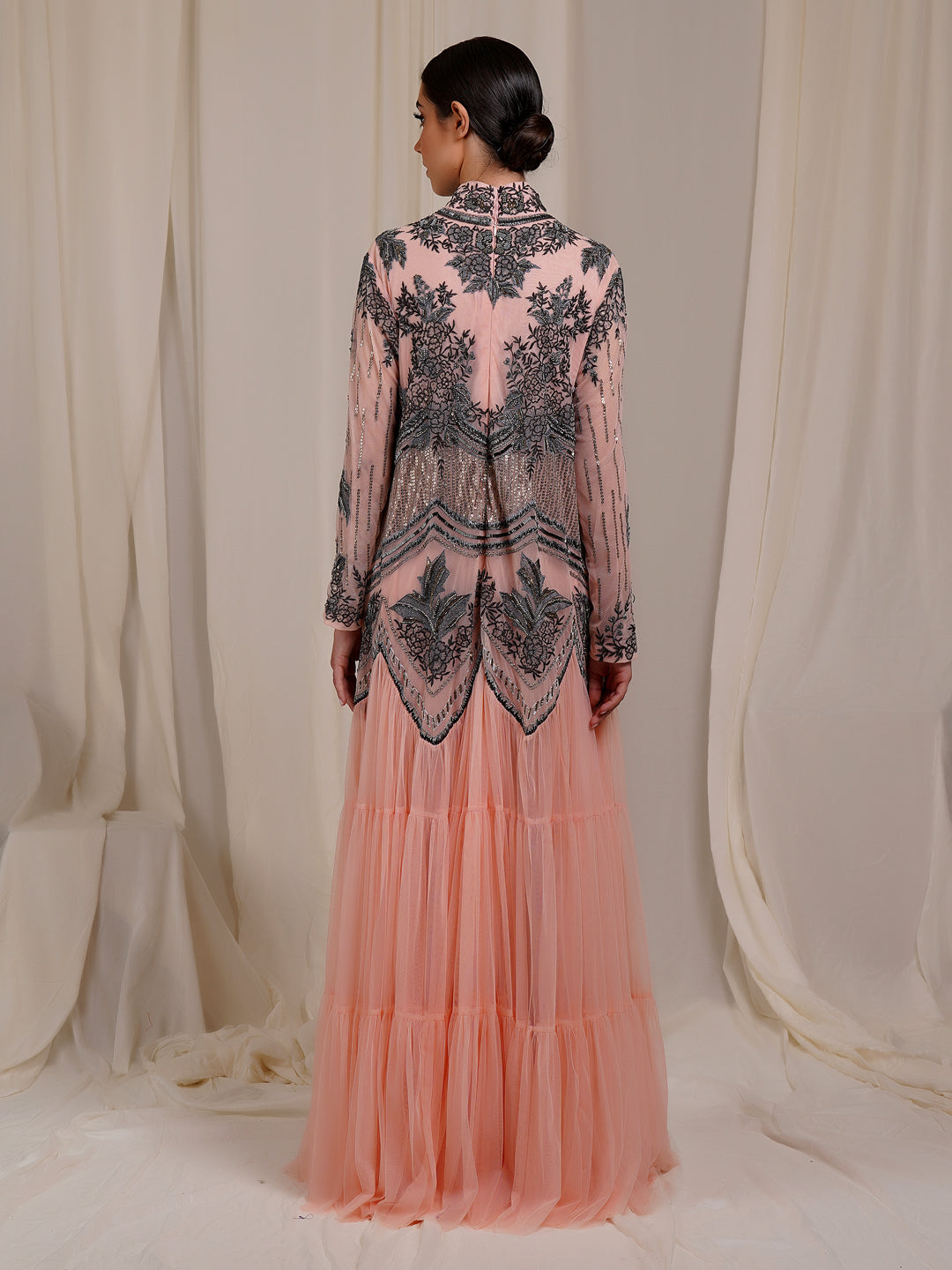 A-Line, High Neck Gown in net At The Top That Is Adorned With Unique Patterns