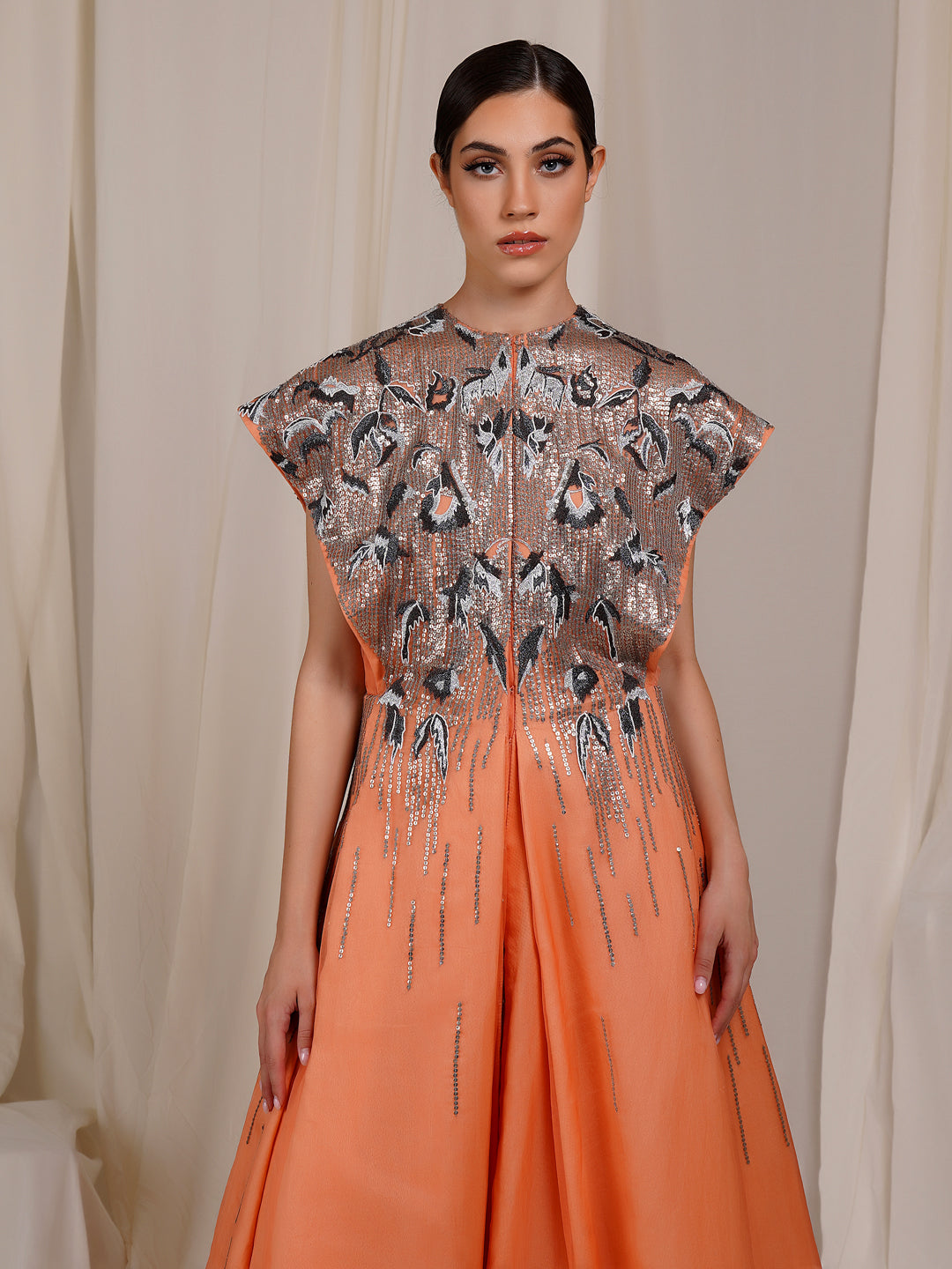 A Peach organza Silk Jacket Gown With Sturdy And Extended Shoulders