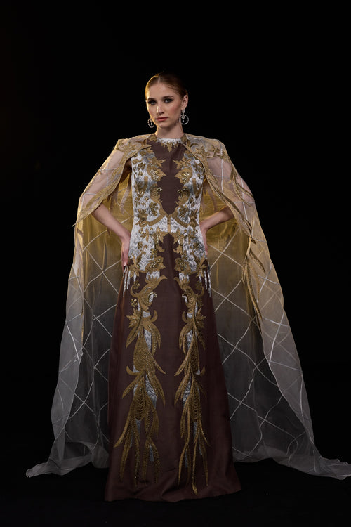 Brown Cape Gown With Structured Bodice , Sheer Draped Sleeves And Intricate Gold & Silver Embroidery