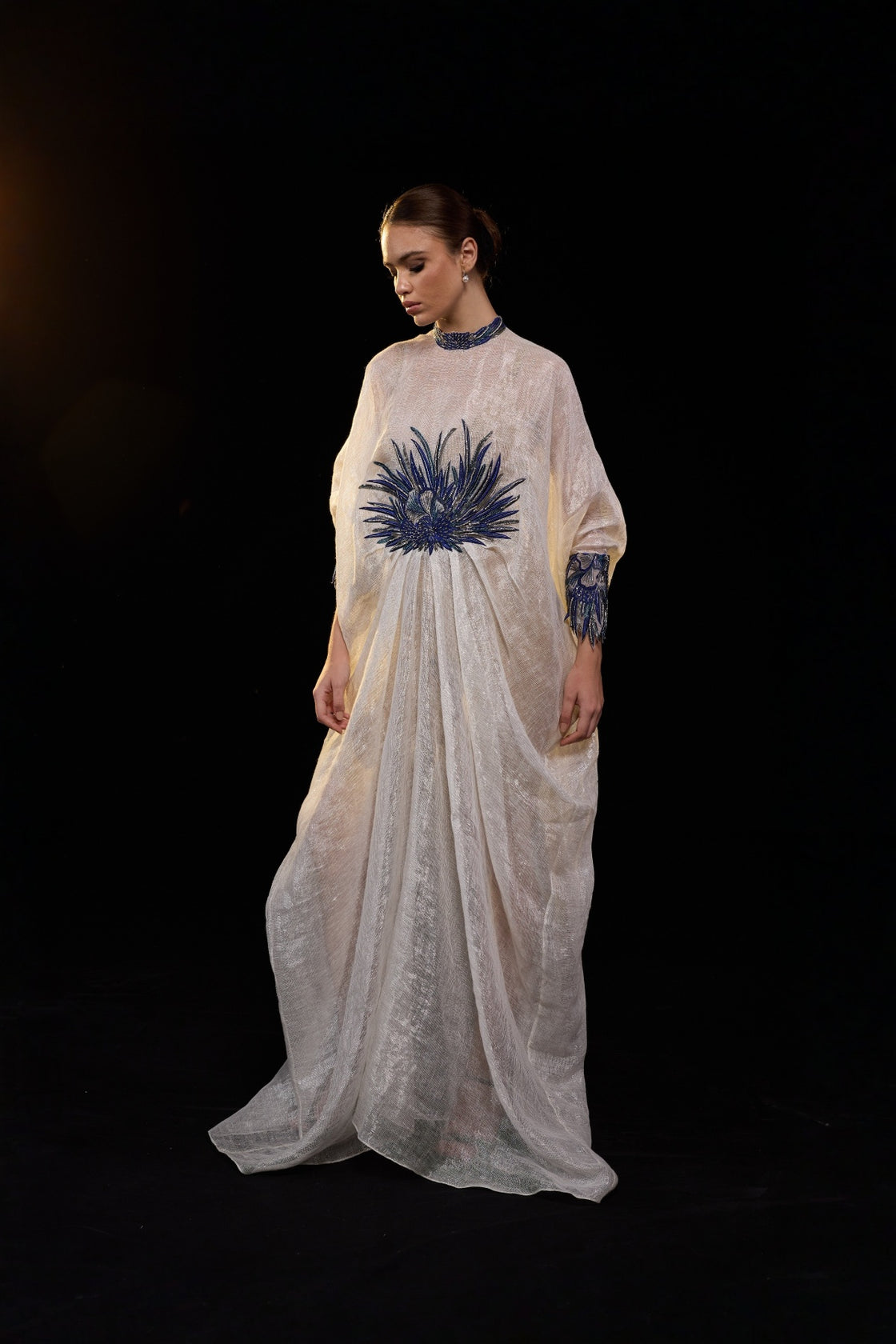 Ivory Draped Gown With Blue Statement Embroidery, High Neckline And Flowly Kaftan-Style Silhouette