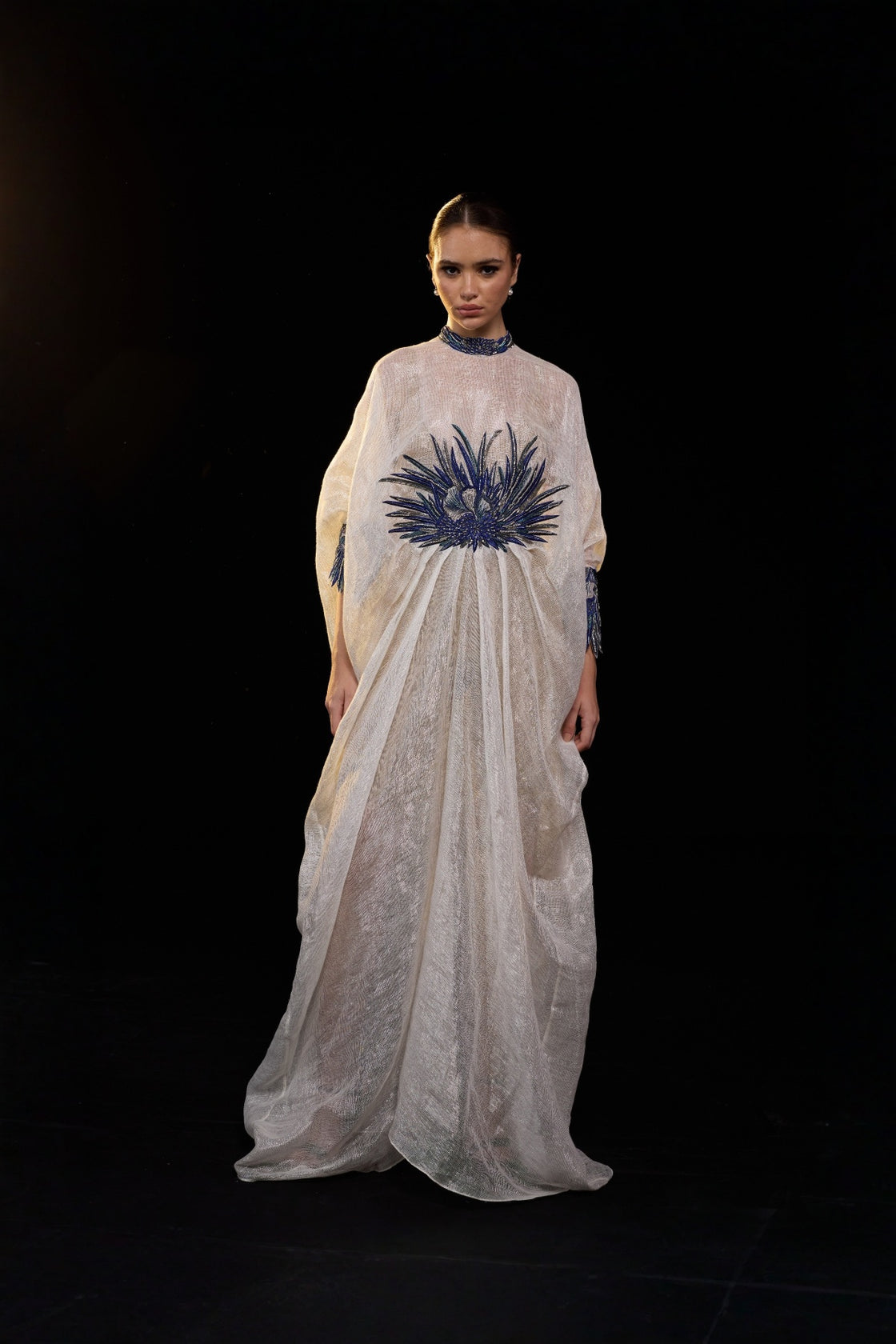 Ivory Draped Gown With Blue Statement Embroidery, High Neckline And Flowly Kaftan-Style Silhouette