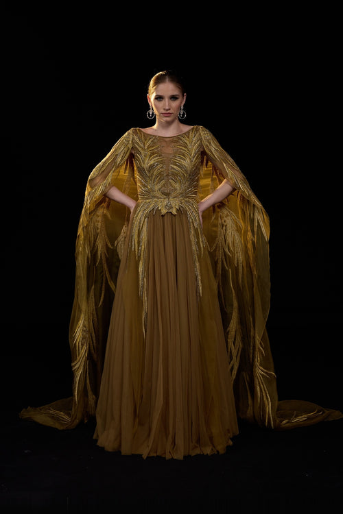 Golden-Bronze Embroidered Gown With Sheer Cape Sleeves , Structured Bodice And Flowy Pleated Bottom