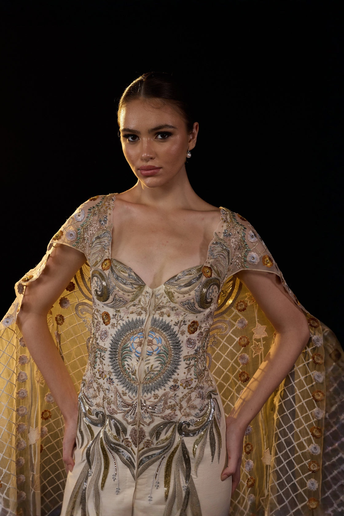 Ivory Embroidered Gown With Sheer Embellished Cape Sleeves And Intricate Metallic Detailing