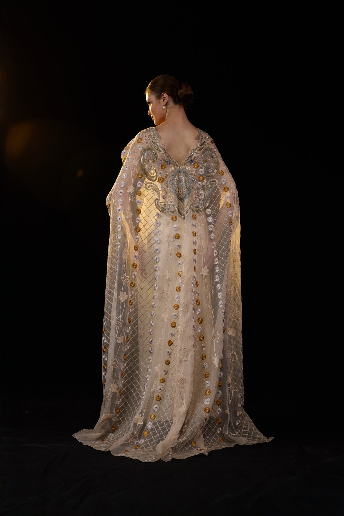 Ivory Embroidered Gown With Sheer Embellished Cape Sleeves And Intricate Metallic Detailing
