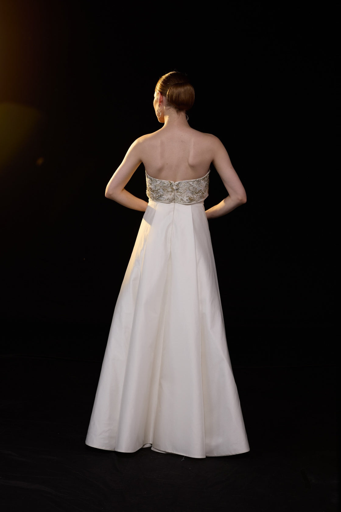 Ivory Strapless Embroidered Gown With Structured Bodice Enhanced With Metallic Embellishments