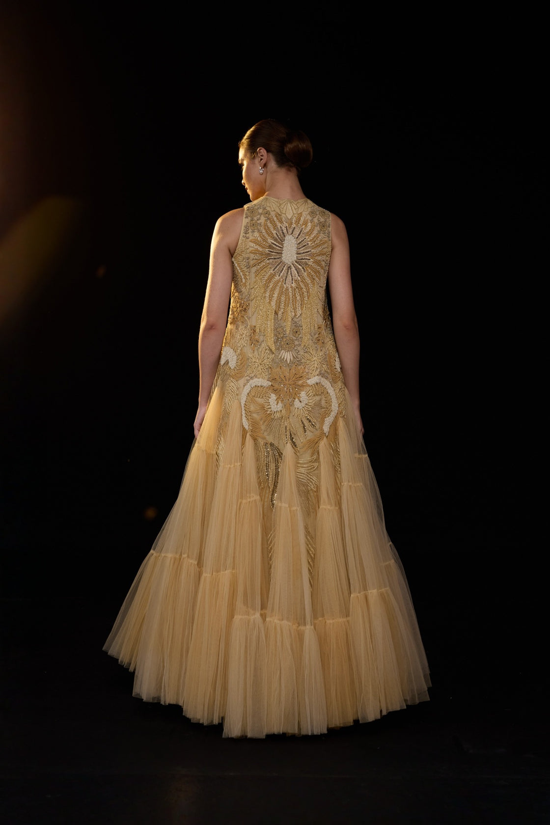 Beige Sleeveless Tulle Gown With Intricate Golden Embellishment