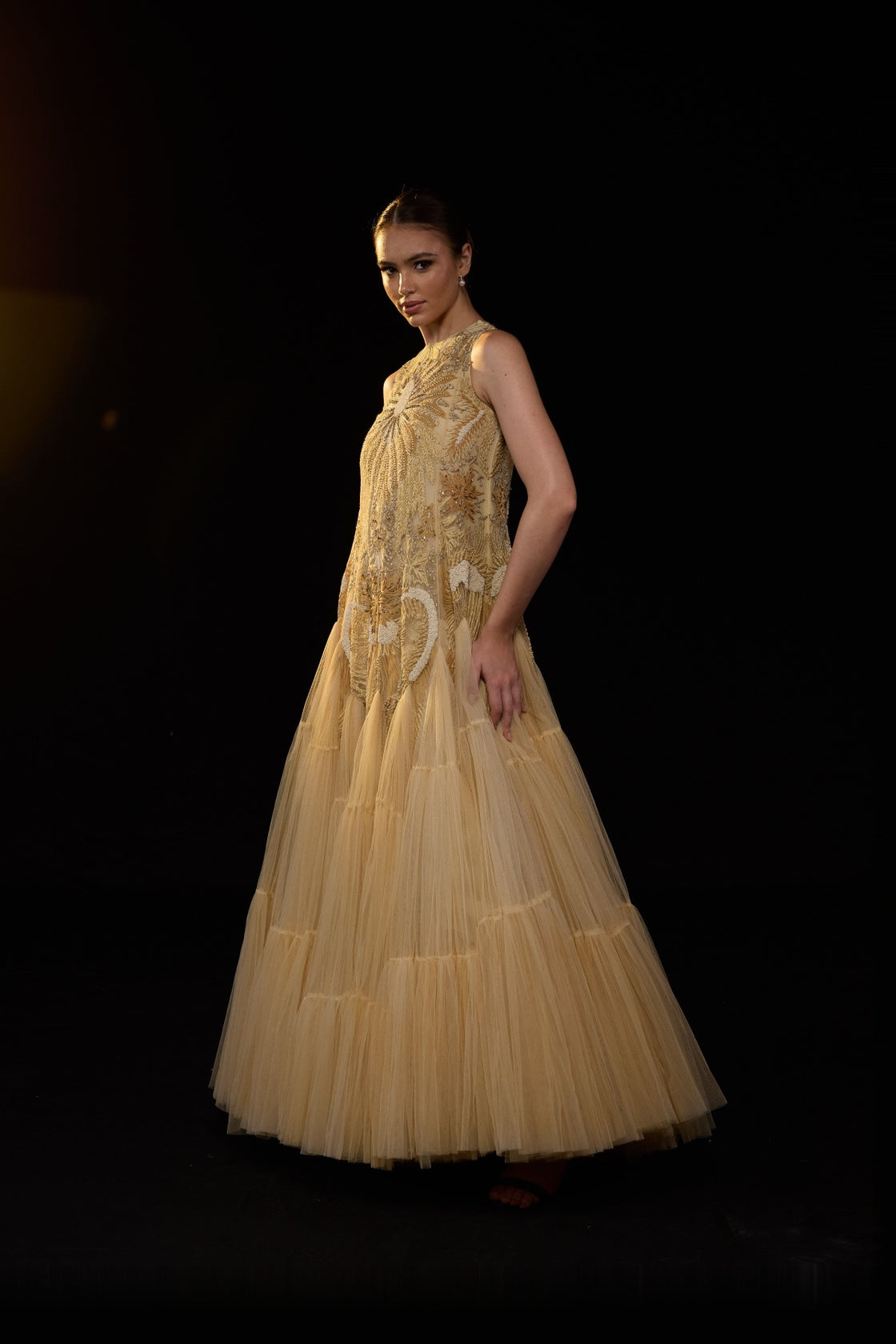 Beige Sleeveless Tulle Gown With Intricate Golden Embellishment