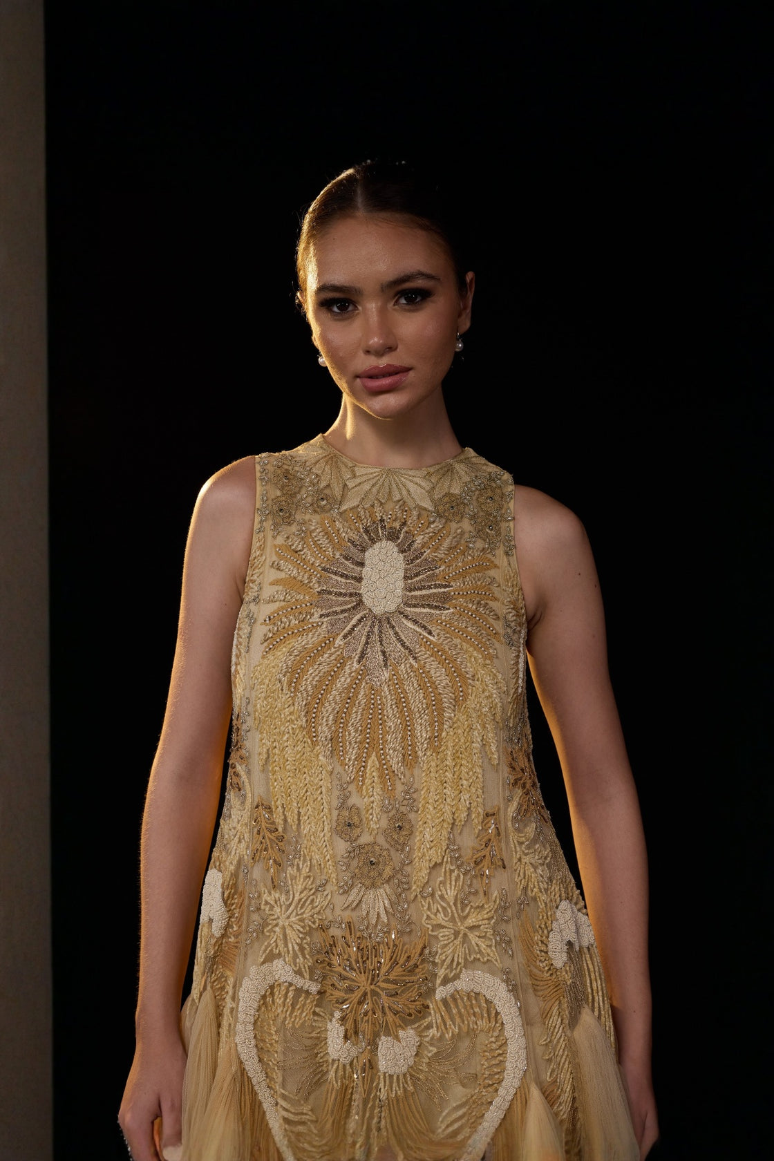 Beige Sleeveless Tulle Gown With Intricate Golden Embellishment