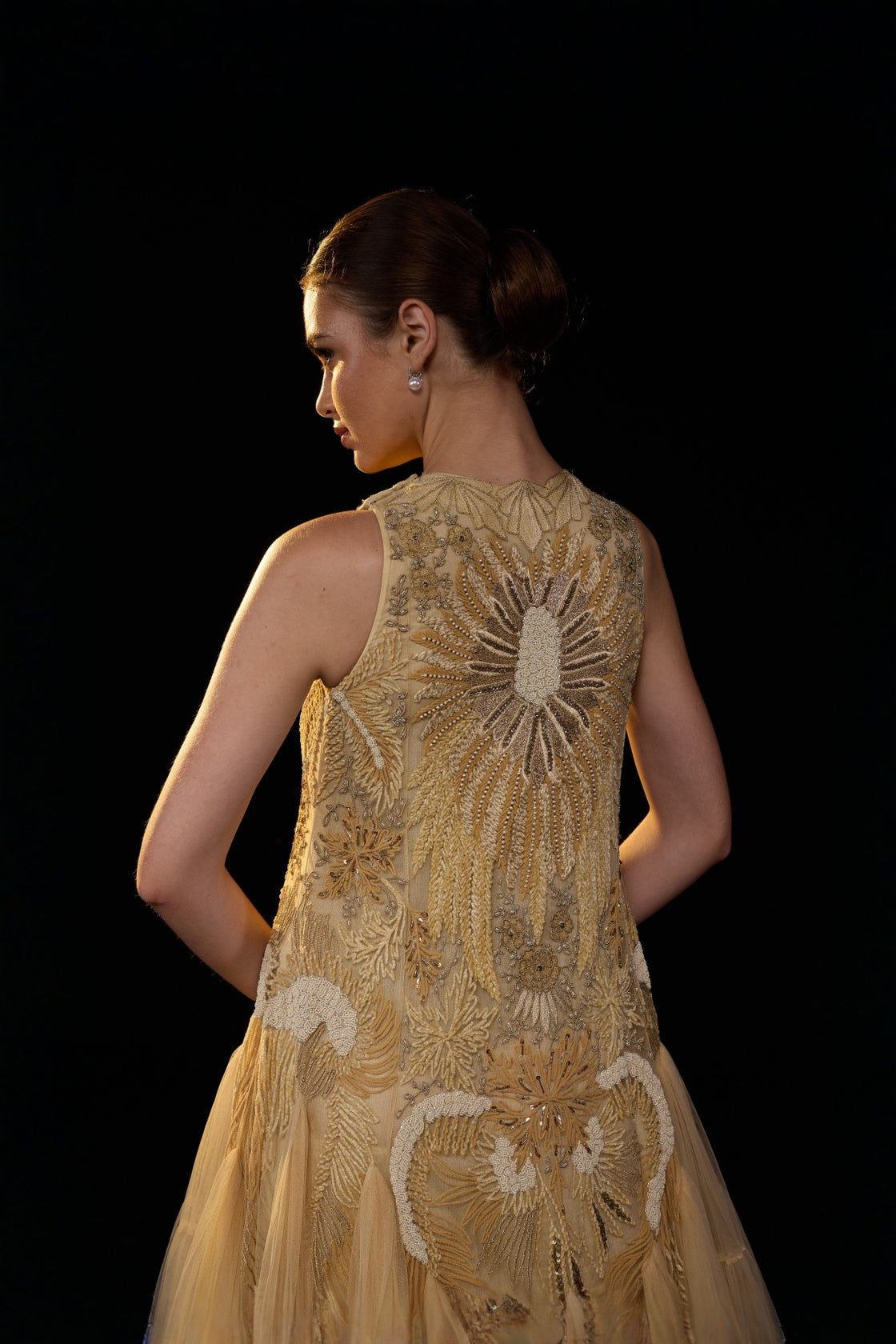 Beige Sleeveless Tulle Gown With Intricate Golden Embellishment