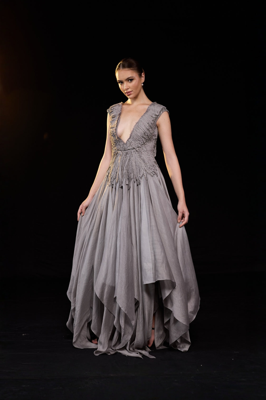 Grey Draped Gown With A Deep V-Necline And Gathered Waist