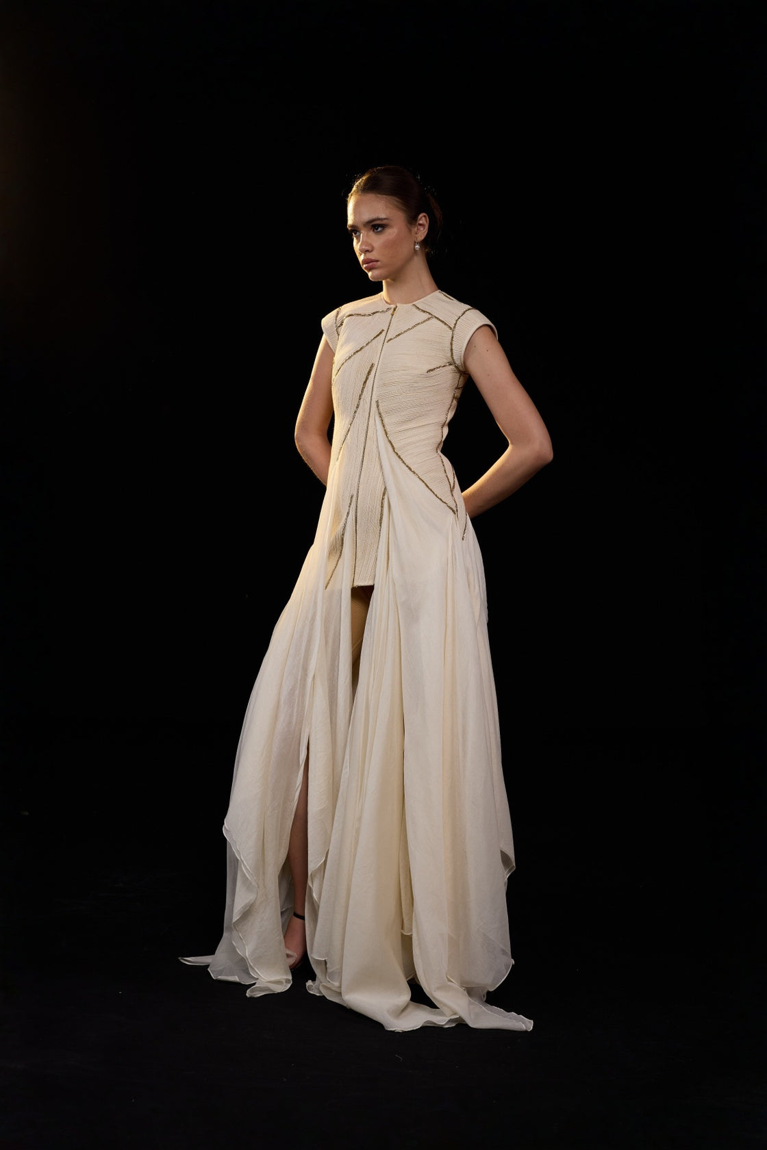 Ivory Structured Gown With Geometric Detailing And Flowing Layered Panels
