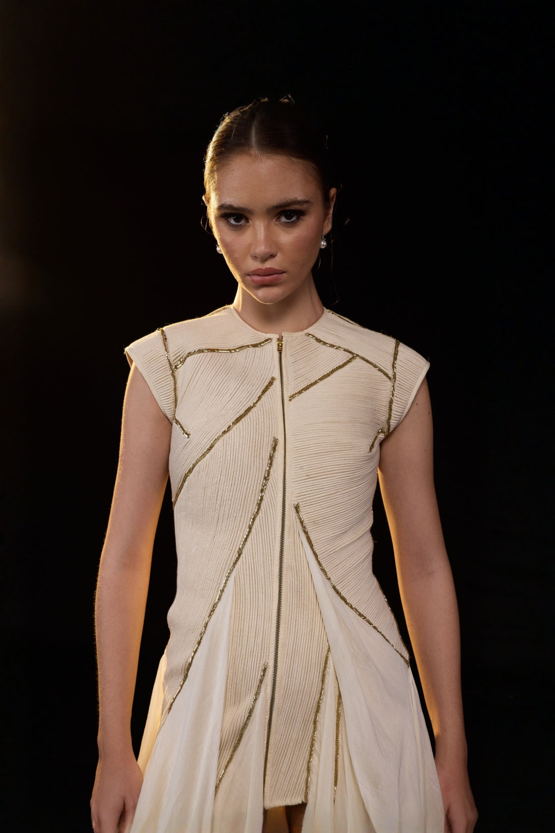 Ivory Structured Gown With Geometric Detailing And Flowing Layered Panels