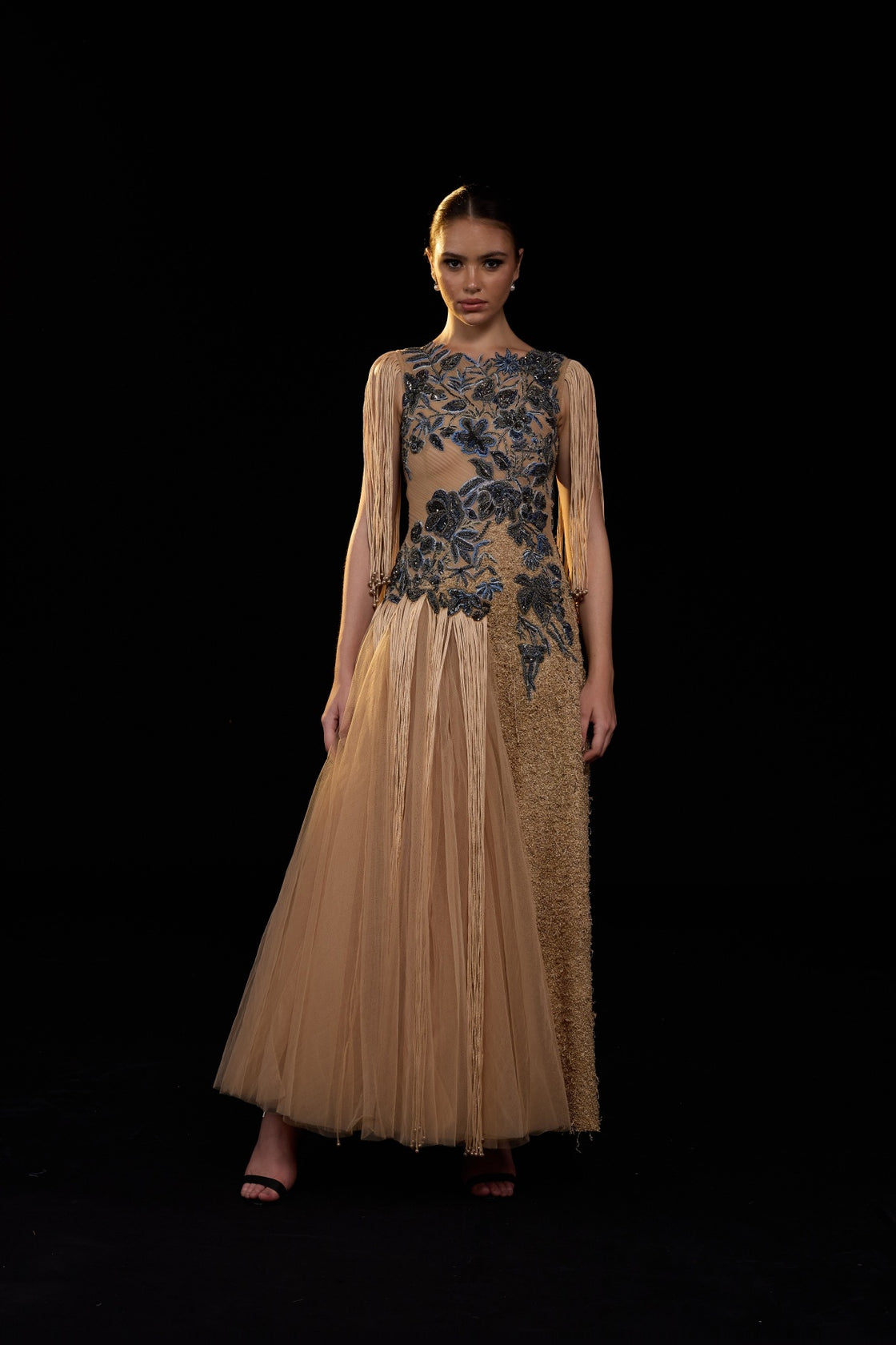 Beige Gown Adorned With Intricate Blue Floral Embroidery And Dramatic Fringe Sleeves
