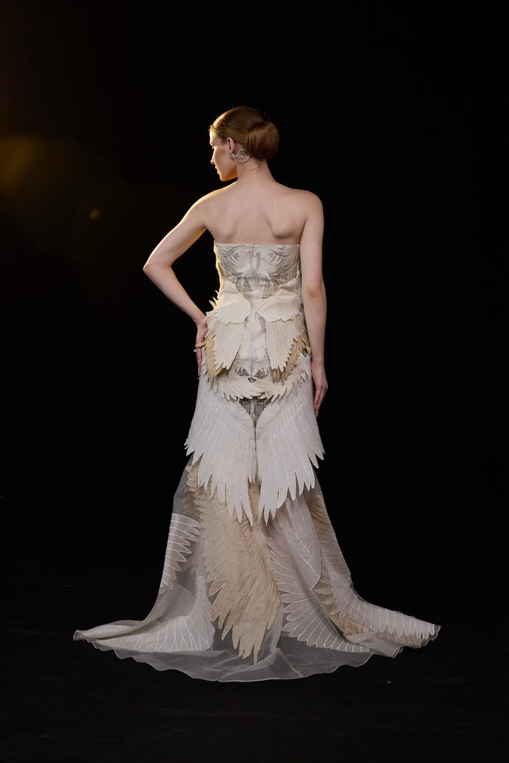 Ivory Strapless Mermaid Gown With Sculpted Feather Applique And Intricate Embellisments And Flared Hem