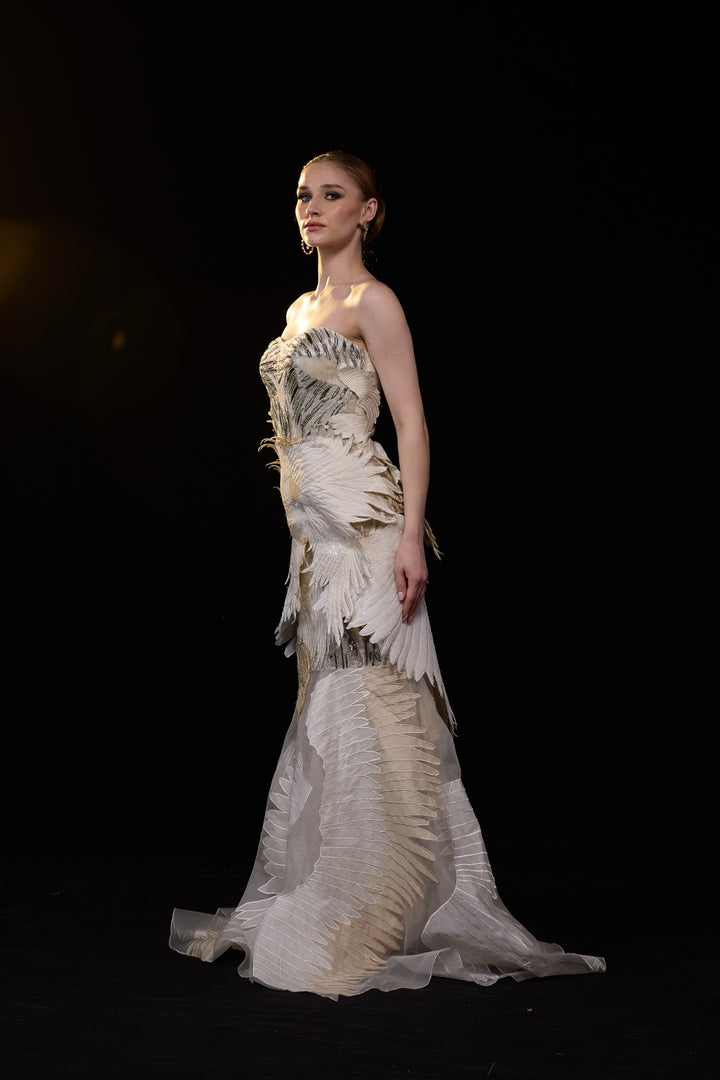 Ivory Strapless Mermaid Gown With Sculpted Feather Applique And Intricate Embellisments And Flared Hem