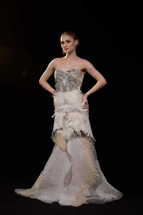 Ivory Strapless Mermaid Gown With Sculpted Feather Applique And Intricate Embellisments And Flared Hem